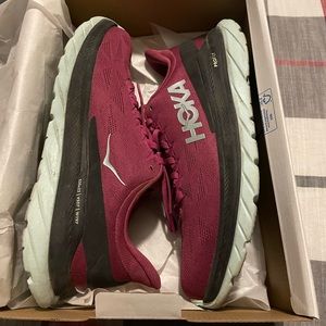 Womens Hoka Mach 4 size 9.5 B in excellent condition. Practically New